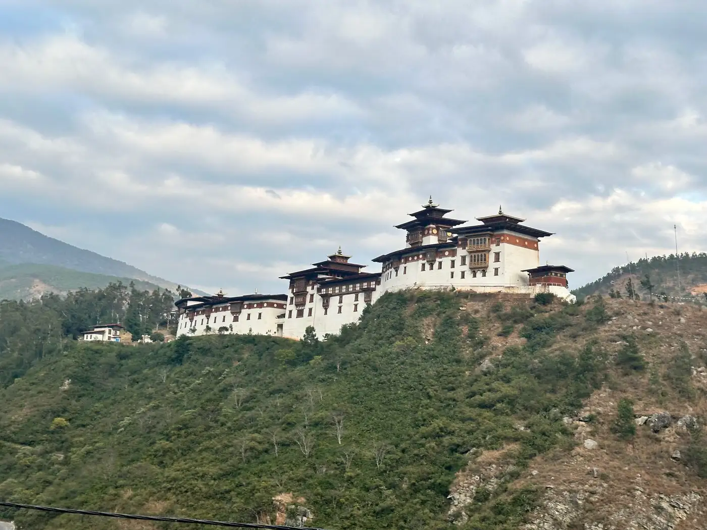 Wangduephodrang Dzong on a hill above the valley