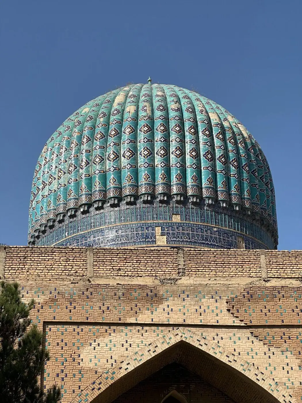 The turquoise dome of Bibi-Khanym mosque rising over Samarkand